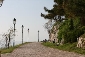 architecture, bench, bush, Croatia, day, eye level view, Istarska, lamppost, natural light, object, park, path, pavement, spring, sunny, tree, vegetation