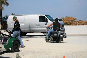 back, day, eye level view, Florida, man, Miami, motorcycling, natural light, sunny, The United States, van, winter