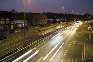 artificial lighting, car, car lights, city lights, elevated, England, evening, lamppost, London, night, outdoor lighting, road, The United Kingdom, traffic, urban, winter