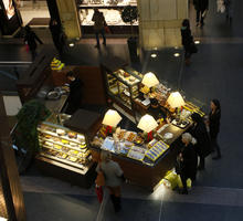 artificial lighting, food, indoor lighting, looking down, Mazowieckie, people, Poland, shopping centre, stand, standing, Warsaw, winter