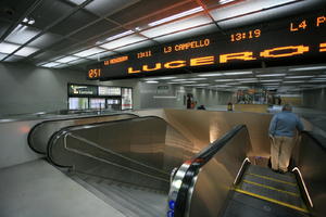 artificial lighting, Calpe, escalator, eye level view, fluorescent, indoor lighting, interior, LED, sign, Spain, station, steps, underground, Valenciana