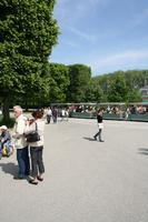 couple, day, eye level view, France, group, Ile-De-France, landmarks, Palace of Versailles, Paris, park, pavement, people, spring, summer, summer, sunny