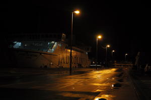 artificial lighting, city, Croatia, eye level view, ferry, night, spring, street, street light, wet, Zadar, Zadarska