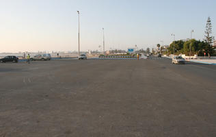 autumn, car, day, direct sunlight, dusk, Essaouira, eye level view, lamppost, Morocco, natural light, parking, sunlight, sunshine