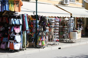 architecture, bag, canopy, clothing, Croatia, day, eye level view, Istarska, market, natural light, object, spring, stall, street, summer, sunny