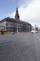 building, car, Copenhagen , day, Denmark, eye level view, Kobenhavn, pavement, spire, sunny, van, winter