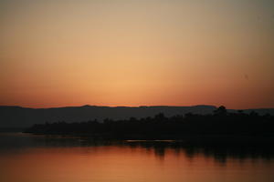 clear, dusk, East Timor, Egypt, Egypt, eye level view, river, river Nile, silhouette, sky, sunset, vegetation