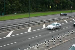 car, day, elevated, England, grass, guardrail, London, natural light, road, The United Kingdom, vegetation