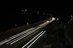 artificial lighting, car lights, city lights, elevated, England, evening, London, night, outdoor lighting, road, The United Kingdom, urban, winter