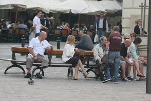 autumn, day, eye level view, group, Malta, Malta, natural light, people, sitting, street