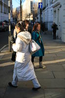 afternoon, casual, day, England, eye level view, London, natural light, people, side, street, The United Kingdom, walking, winter, winter, woman