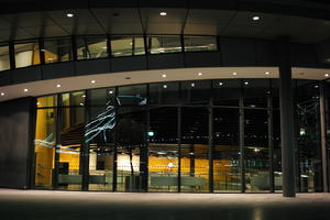 artificial lighting, building, city, city lights, England, entrance, eye level view, facade, Liverpool, night, office building, outdoor lighting, The United Kingdom, urban