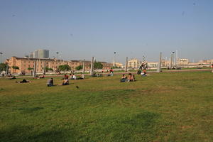 Barcelona, Cataluña, day, eye level view, grass, park, people, sitting, Spain, summer, sunny