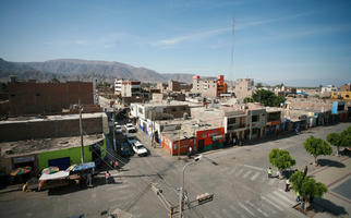 building, car, day, elevated, Ica, natural light, Nazca, Peru, street, sunny, town, vegetation