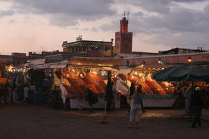 artificial lighting, evening, eye level view, food, market, Marrakech, Marrakesh, Morocco, object, people, square, stall, tourist