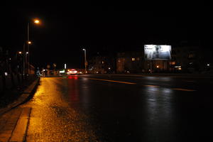 artificial lighting, city lights, eye level view, Kalisz, night, outdoor lighting, Poland, street, urban, wet, Wielkopolskie, winter