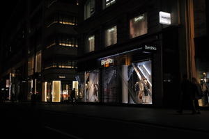 artificial lighting, England, eye level view, London, mannequin, night, outdoor lighting, retail, shop, sign, street, The United Kingdom