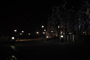 artificial lighting, city, city, city lights, embankment, England, eye level view, London, night, pavement, pavement, promenade, sidewalk, street light, The United Kingdom, winter