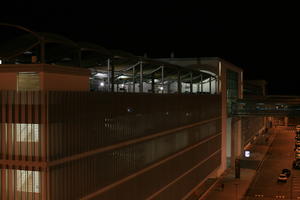 airport, artificial lighting, elevated, eye level view, louvres, Madrid, night, parking, Spain, street