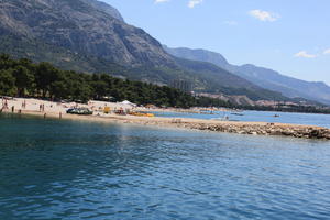 beach, coastline, Croatia, day, eye level view, Makarska, people, seascape, Splitsko-Dalmatinska, summer, sunbathing, tree, vegetation