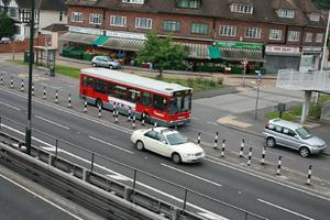 bus, car, day, elevated, England, guardrail, London, natural light, retail, road, The United Kingdom, vegetation