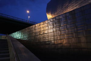 artificial lighting, Bilbao, building, evening, eye level view, facade, Guggenheim Museum, Pais Vasco, Spain, wall