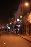 arabic, artificial lighting, autumn, crowd, Essaouira, eye level view, Morocco, night, people, street, town