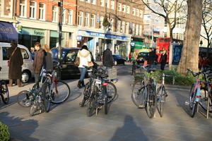 afternoon, bicycle, day, England, eye level view, group, London, natural light, people, retail, street, The United Kingdom, transport, walking, winter, winter