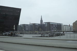 bicycle, building, Copenhagen , day, Denmark, eye level view, Kobenhavn, overcast, pavement, street