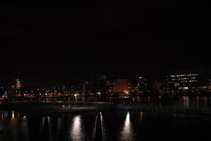 artificial lighting, city, city, city lights, cityscape, England, eye level view, London, night, river, riverbank, The United Kingdom, waterfront, winter