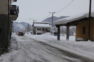 ambient light, day, diffuse, diffused light, eye level view, house, Italia , morning, natural light, overcast, road, snow, Veneto, winter