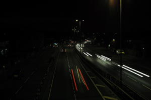 artificial lighting, car, car lights, city lights, elevated, England, evening, London, night, outdoor lighting, road, The United Kingdom, traffic, urban, winter