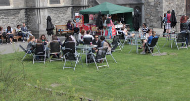 cafe, chair, day, diffuse, diffused light, eye level view, furniture, group, Ireland, people, sitting, summer, umbrella