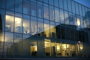 artificial lighting, building, dusk, England, evening, eye level view, facade, London, office, spring, The United Kingdom