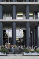 afternoon, building, cafe, colonnade, column, diffused light, drinking, eating, England, eye level view, facade, fence, glass, London, outdoors, people, restaurant, sitting, square, The United Kingdom, urban