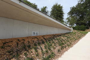 building, campus, day, direct sunlight, eye level view, France, Franche-Comte, natural light, nature, open space, outdoors, Ronchamp, summer, sunny, walkway, wall