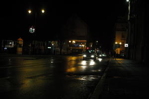 artificial lighting, city lights, eye level view, Kalisz, night, outdoor lighting, Poland, street, urban, wet, Wielkopolskie, winter