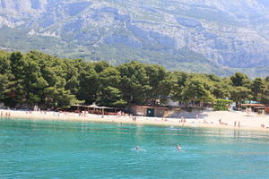 beach, Croatia, day, eye level view, Makarska, people, seascape, Splitsko-Dalmatinska, summer, sunbathing, swimming, tree, vegetation, woodland