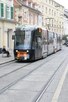 Austria, autumn, day, diffuse, diffused light, eye level view, Graz, natural light, Steiermark, street, tram, tramlines