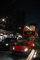 artificial lighting, bus, car, city, city lights, England, eye level view, London, night, outdoor lighting, street, The United Kingdom, urban