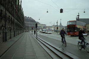 bus, car, Copenhagen , cycling, day, Denmark, eye level view, girl, Kobenhavn, overcast, pavement, street