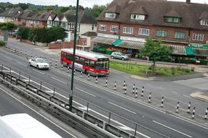 bus, car, day, elevated, England, guardrail, London, natural light, retail, road, The United Kingdom, vegetation