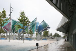 architecture, art, Barcelona, bin, branch, Cataluña, eye level view, facade, object, overcast, pavement, sculpture, Spain, tree, vegetation