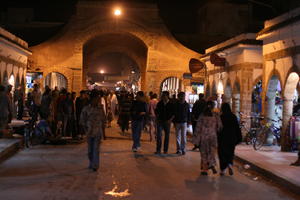 arabic, artificial lighting, autumn, crowd, Essaouira, eye level view, market, Morocco, night, people