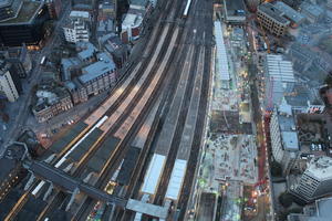 above, aerial view, artificial lighting, city, diffuse, diffused light, England, evening, London, railway, The United Kingdom, urban, winter