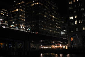 artificial lighting, building, building, city, cityscape, England, eye level view, London, night, office, station, The United Kingdom, winter