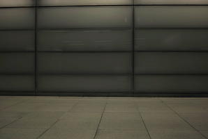 artificial lighting, England, eye level view, London, night, pavement, The United Kingdom, wall