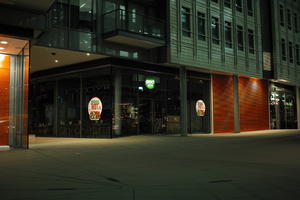 artificial lighting, building, England, eye level view, London, night, pavement, restaurant, spring, The United Kingdom, urban