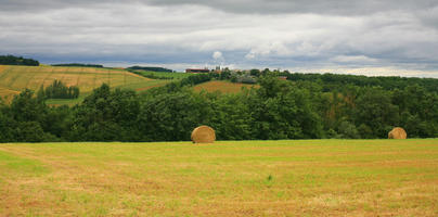 day, eye level view, field, France, grass, hay, haystack, natural light, summer, treeline, valley