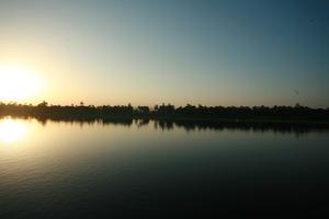 clear, dusk, East Timor, Egypt, Egypt, eye level view, river, river Nile, silhouette, sky, sun, sunset, vegetation